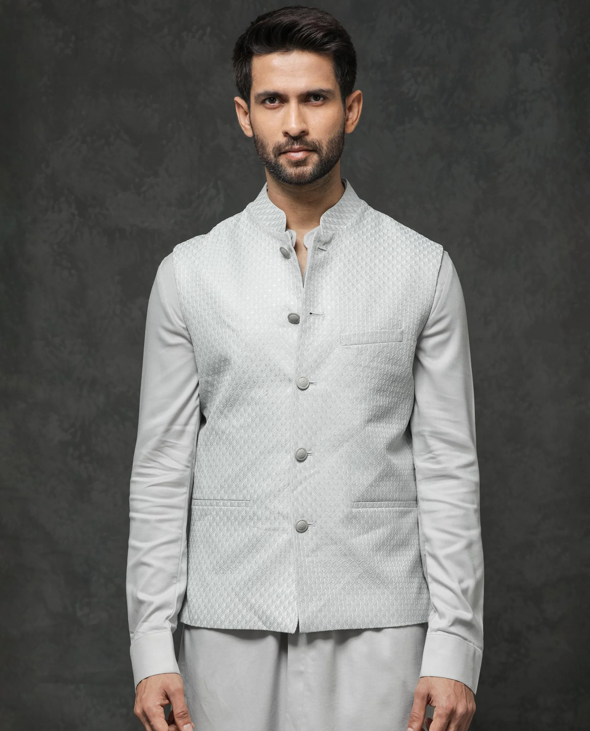 Rare Rabbit Men's Guild Festive Lasmos B1 Light Grey Viscose Embroidered Regular Fit Sleeveless Mandarin Collar Bandhgala Rare Rabbit Men's Lasmos-B1 Beige Viscose Embroidered Regular Fit Sleeveless Mandarin Collar Bandhgala Nehru Jacket