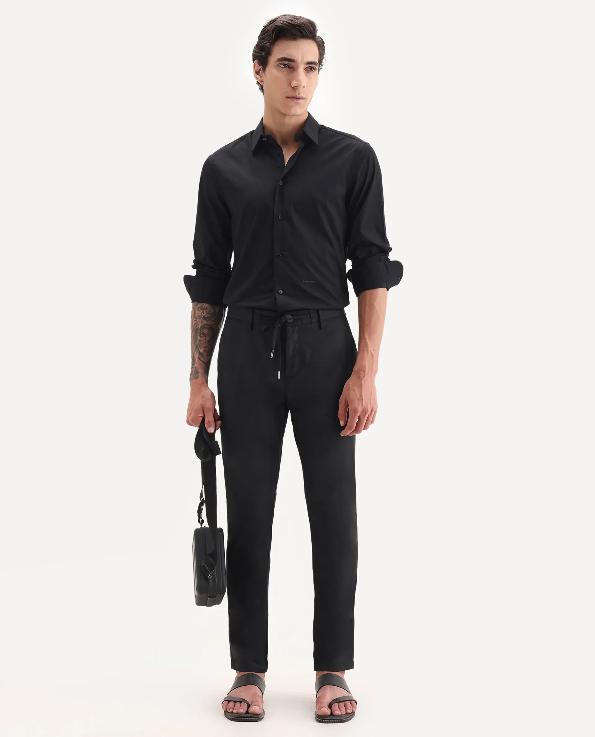 Rare Rabbit Men's Nimb Black Polyester Fabric Drawstring And Button Closure High Rise Regular Fit Solid Trousers