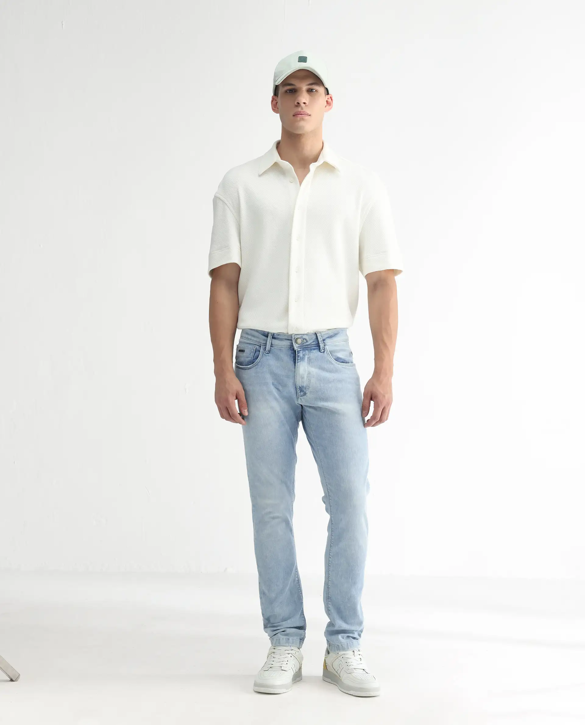 Rare Rabbit Men's Roune Light Blue Cotton Plain Hawk Slim Fit Jeans